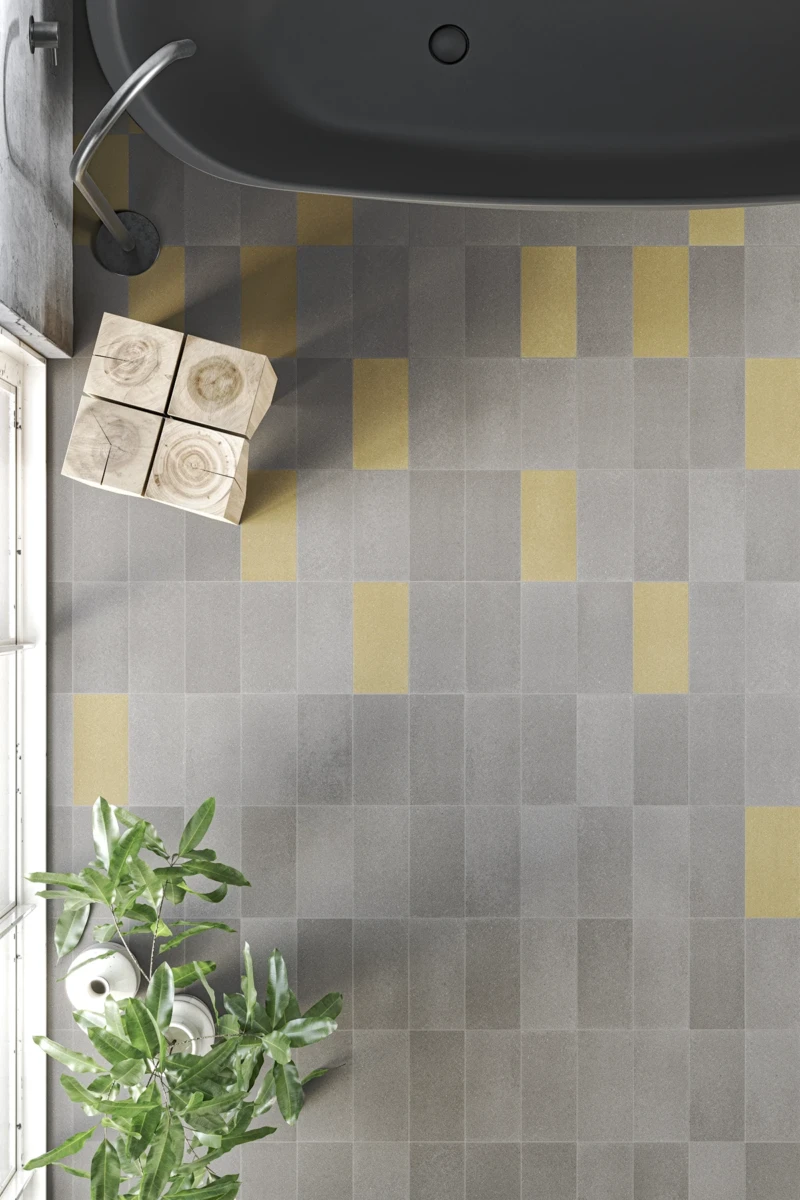 Innenboden kombiniert mit Paviblock Zementfliesen in Grau- und Gelbtönen